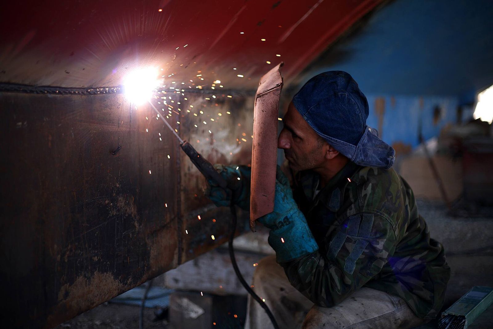 Welding a fixture frame in the metal shop
