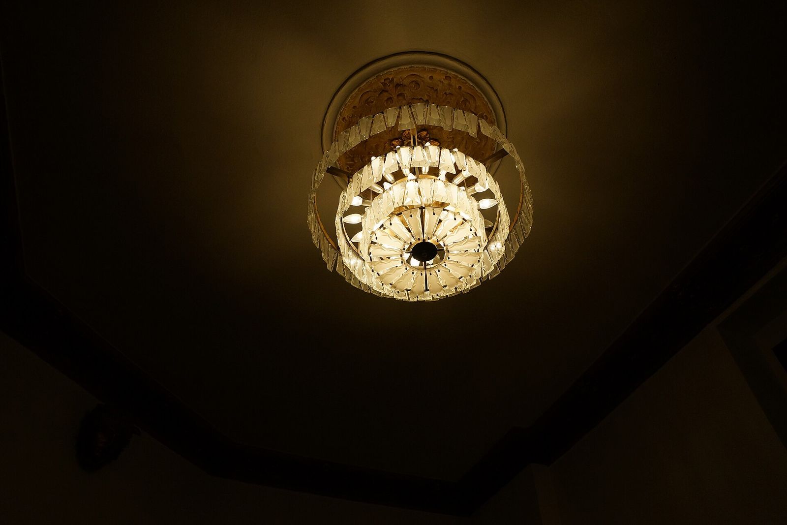 A crystal chandelier seen from below
