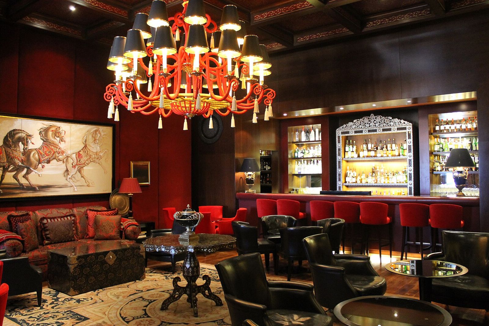 A large chandelier in a hotel bar