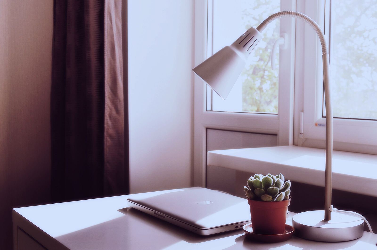 A desk lamp in a bright room
