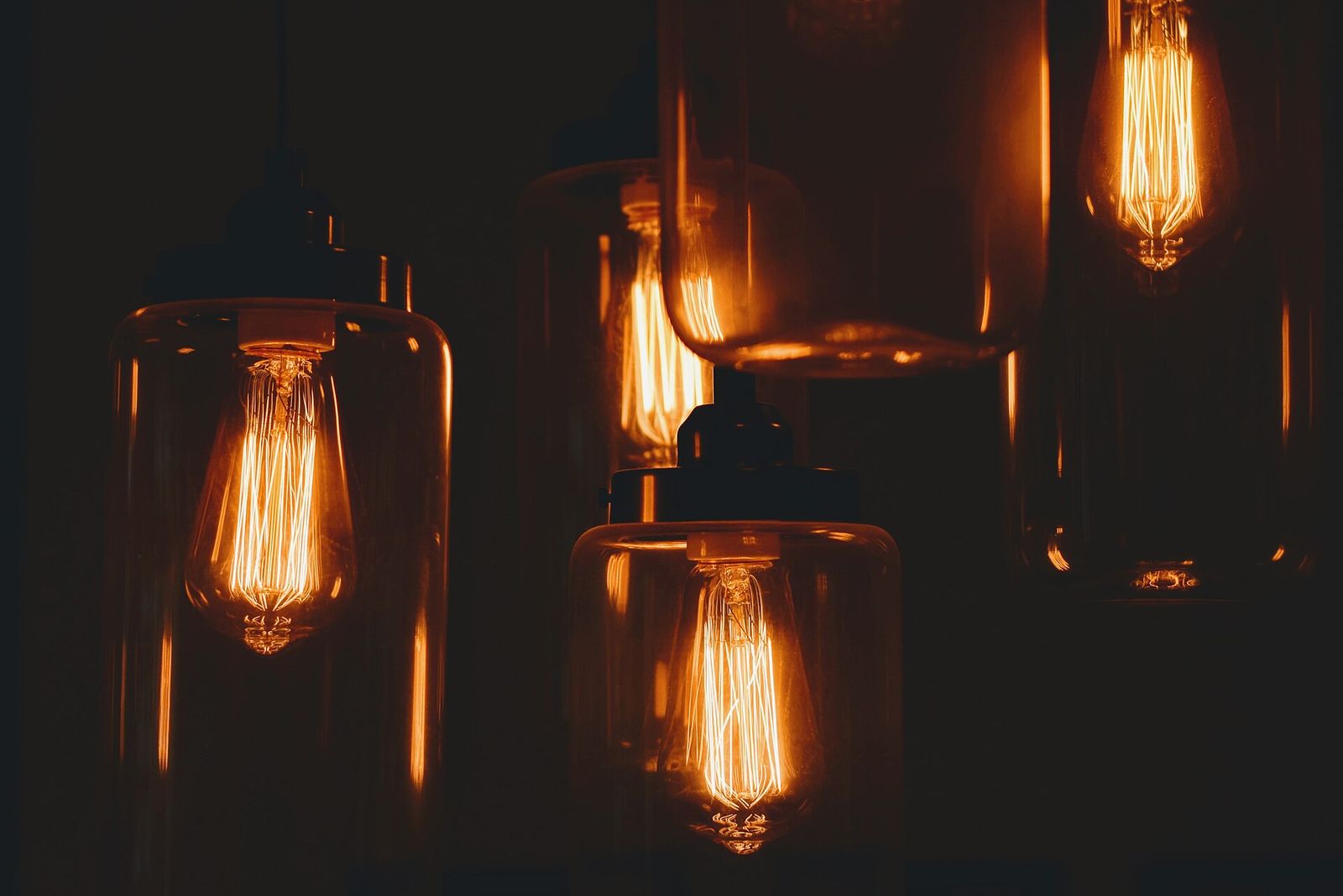 Smoked glass pendants with filament bulbs